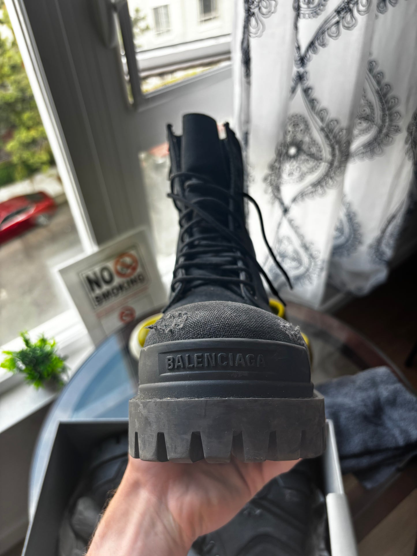 Balenciaga distressed strike boots